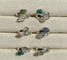 Photo of stones with twin gemstones set in each.